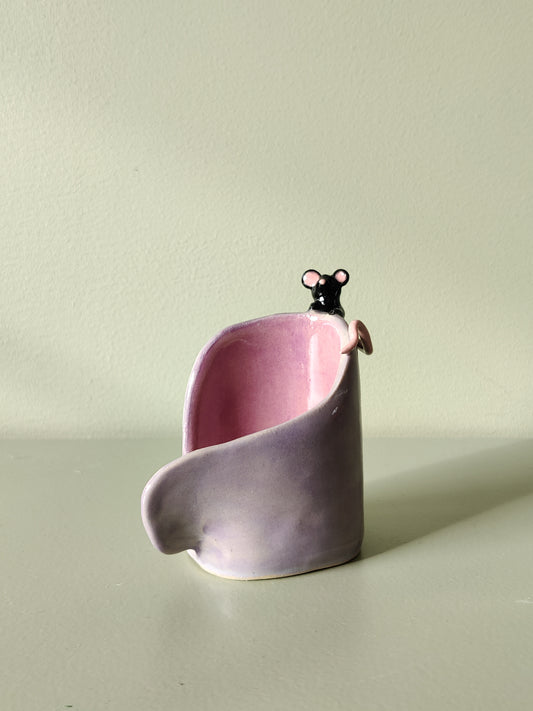 Ljuslykta med liten mus